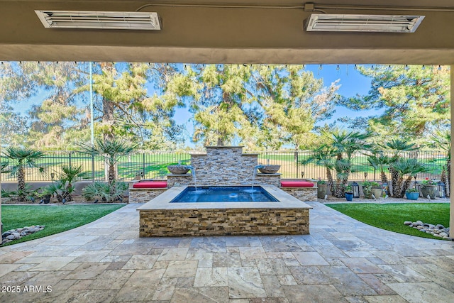 view of patio featuring an in ground hot tub