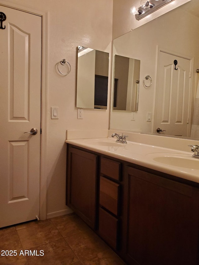 bathroom featuring tile patterned floors and vanity