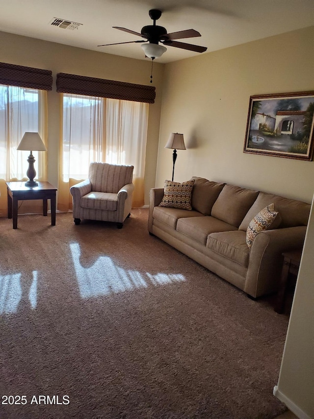 living room with ceiling fan