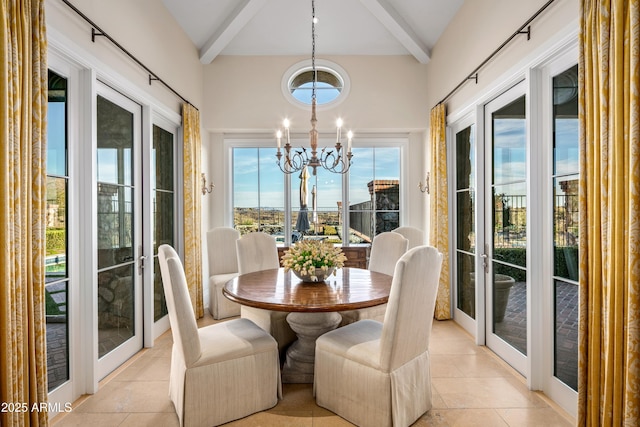 sunroom with a chandelier, french doors, and beamed ceiling