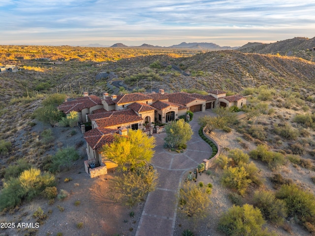 drone / aerial view featuring a mountain view