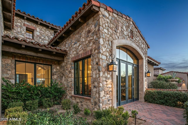 exterior space featuring french doors and a patio area