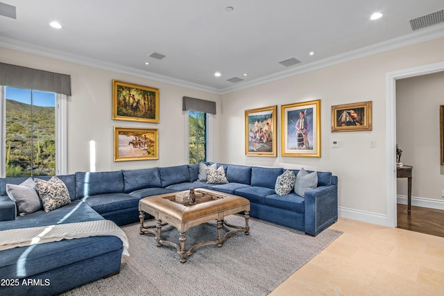 living room with light tile patterned flooring, crown molding, and plenty of natural light