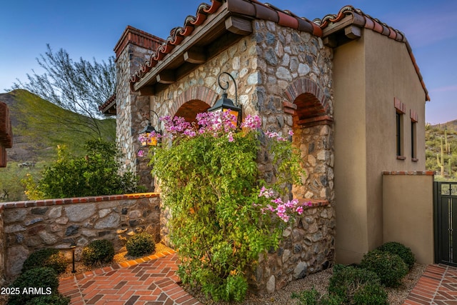 view of property exterior at dusk