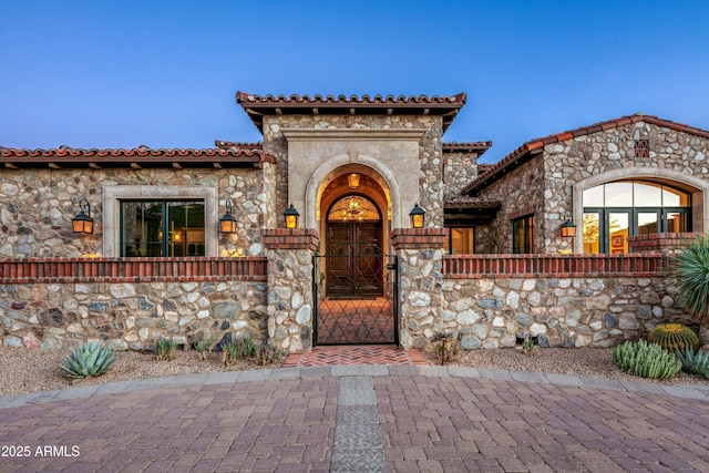 view of mediterranean / spanish-style house