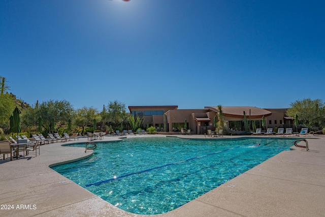 view of pool featuring a patio area