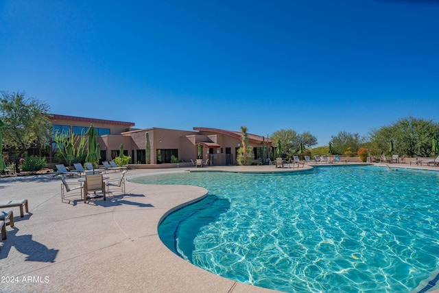 pool with a patio