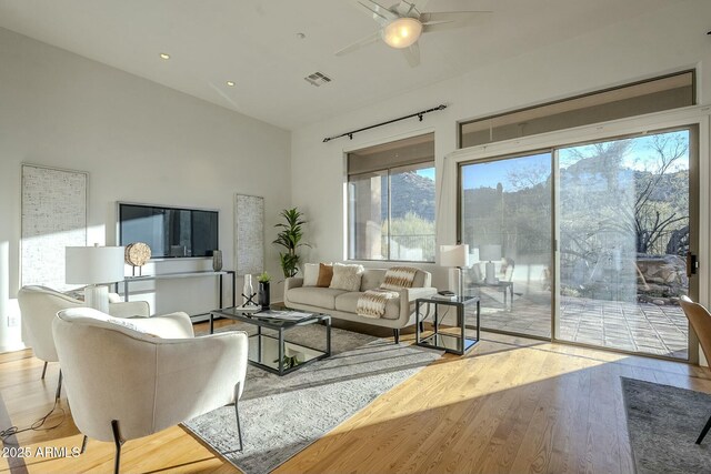 kitchen featuring sink, decorative light fixtures, white cabinetry, and appliances with stainless steel finishes