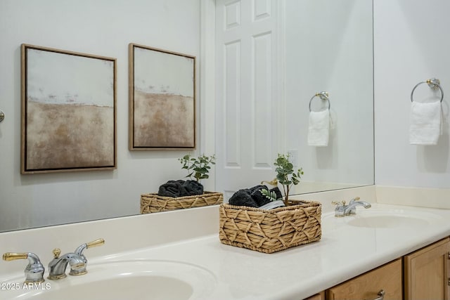 full bath featuring double vanity and a sink