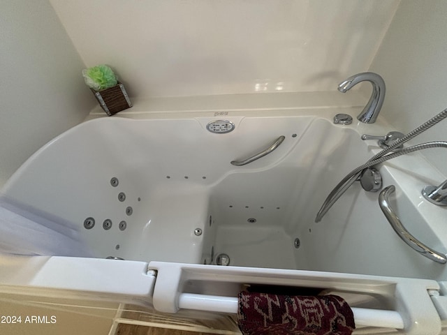 bathroom featuring a jetted tub