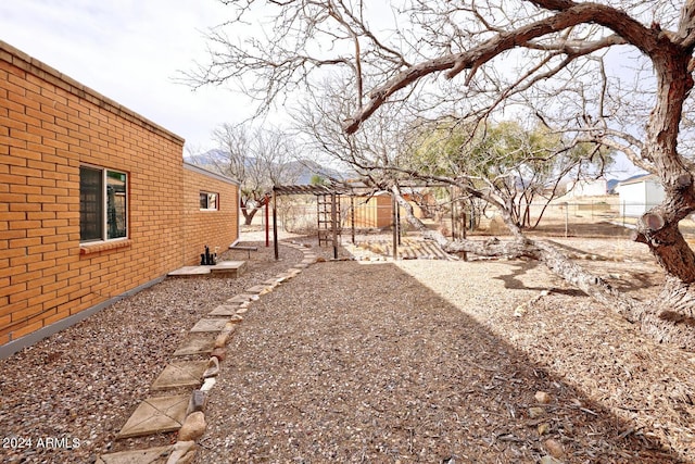 view of yard with fence