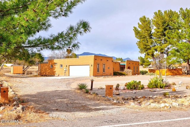 view of front of house featuring driveway and an attached garage
