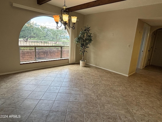 unfurnished room featuring beam ceiling, baseboards, a notable chandelier, and tile patterned flooring