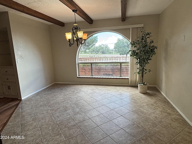 tiled spare room with a chandelier, baseboards, a textured ceiling, and beamed ceiling