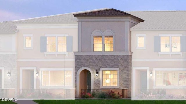 view of front of property featuring stucco siding