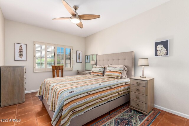 6122 E Saddleback St, Mesa, AZ 85215 - tiled bedroom featuring baseboards and a ceiling fan