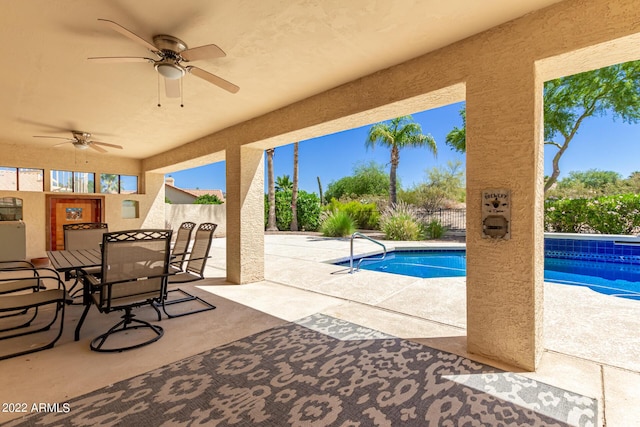 6122 E Saddleback St, Mesa, AZ 85215 - pool featuring a patio, a fenced backyard, ceiling fan, and outdoor dining area
