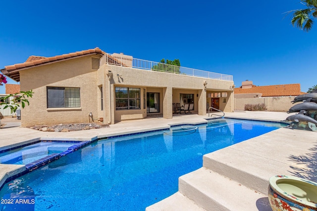 6122 E Saddleback St, Mesa, AZ 85215 - view of pool with a patio, a pool with connected hot tub, and fence
