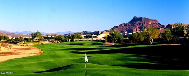6122 E Saddleback St, Mesa, AZ 85215 - view of property's community featuring a mountain view, golf course view, and a yard