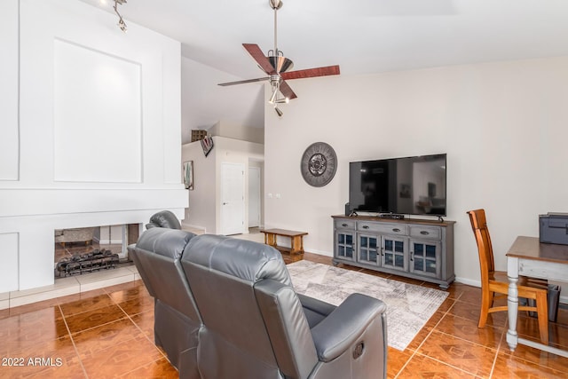 6122 E Saddleback St, Mesa, AZ 85215 - tiled living area with vaulted ceiling and a ceiling fan