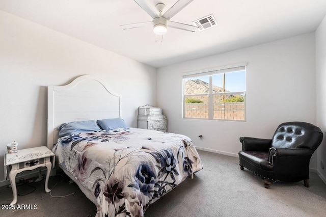 carpeted bedroom featuring visible vents, ceiling fan, and baseboards