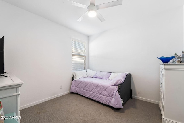 carpeted bedroom featuring a ceiling fan and baseboards