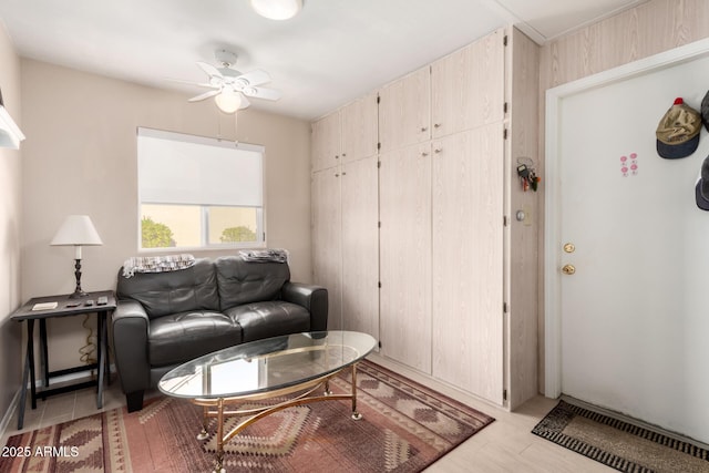 living room featuring ceiling fan