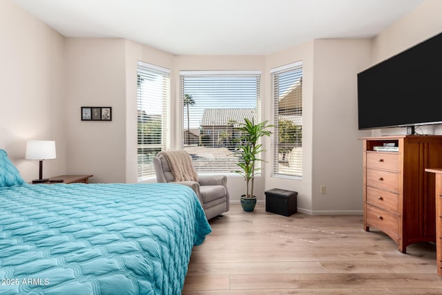 bedroom featuring light hardwood / wood-style floors