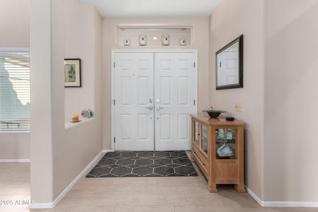 foyer entrance featuring hardwood / wood-style floors