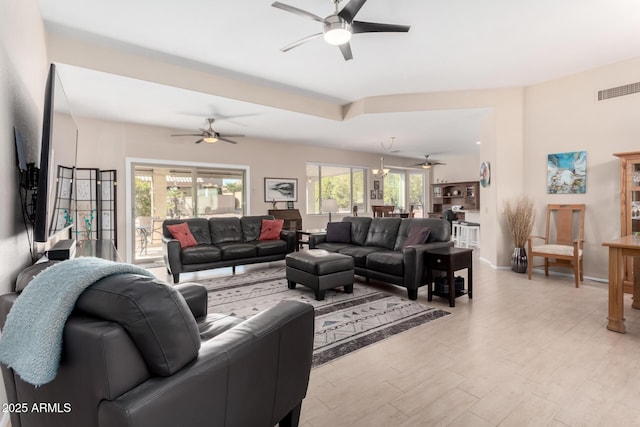 living room featuring ceiling fan and light wood-type flooring