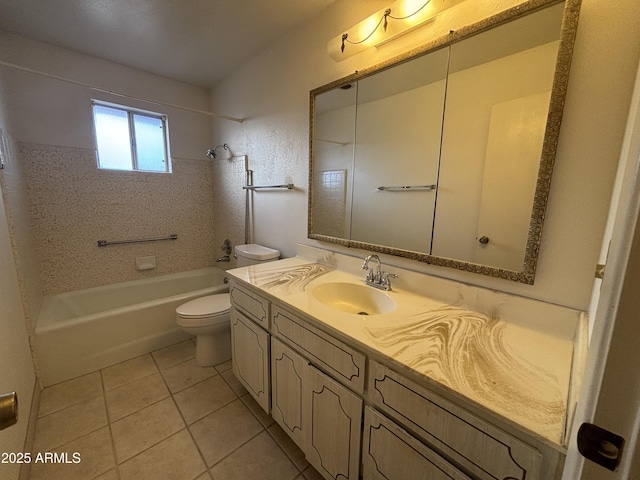 full bathroom with toilet, tile patterned flooring, tiled shower / bath combo, and vanity