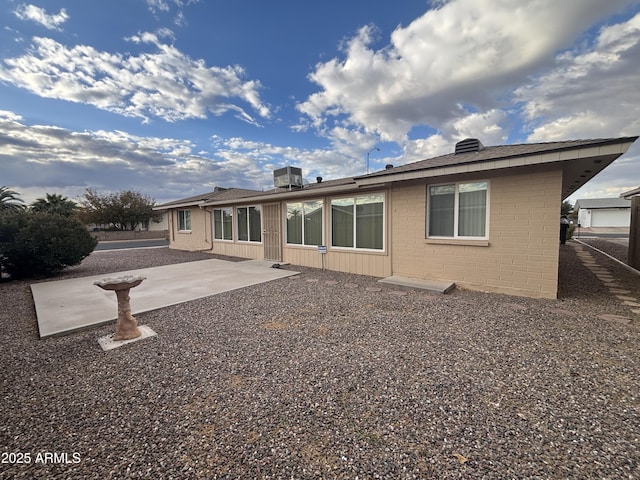 rear view of house with a patio