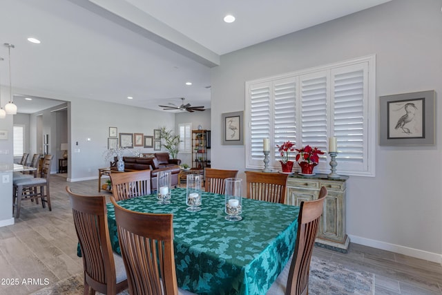 dining area with a wealth of natural light, baseboards, and recessed lighting