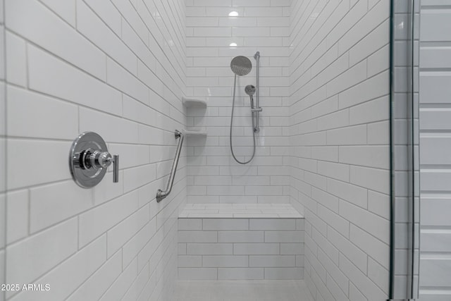 full bathroom with tiled shower