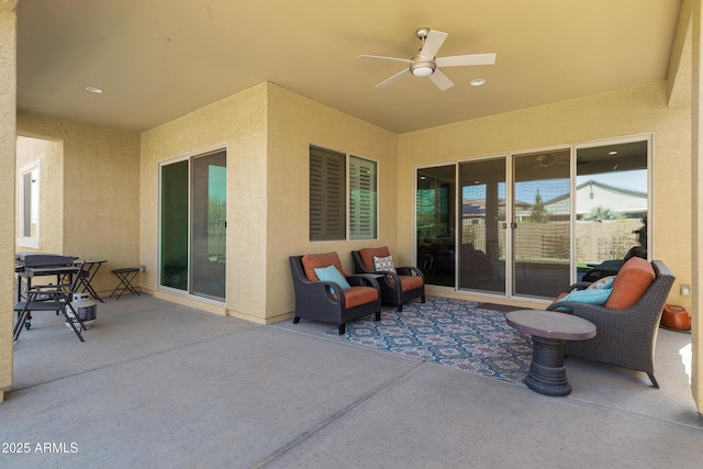 view of patio / terrace featuring ceiling fan