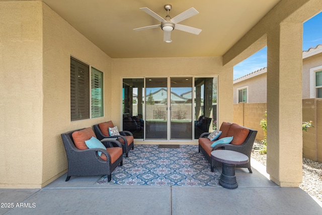 view of patio featuring outdoor lounge area, a ceiling fan, and fence