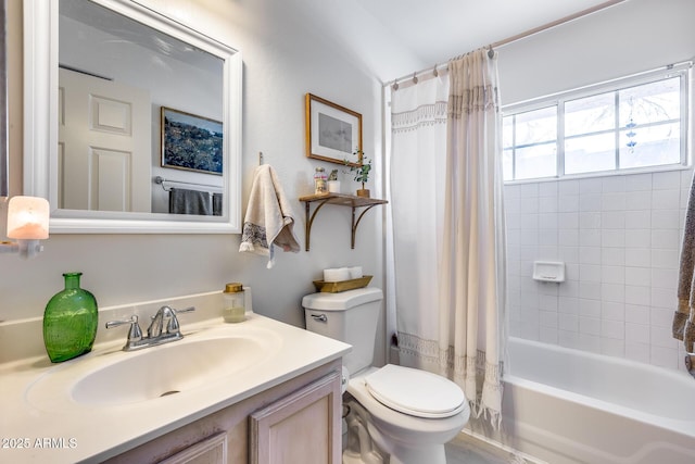 bathroom featuring toilet, shower / bath combo, and vanity