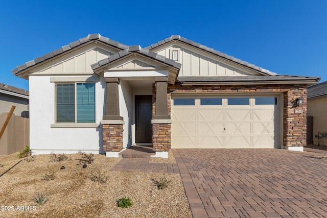 view of front of property featuring a garage