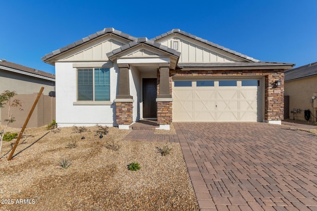 view of front of property with a garage