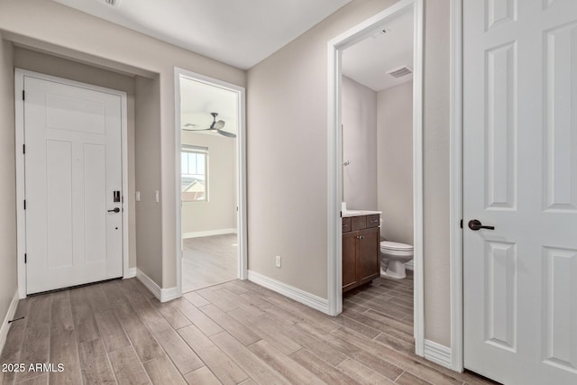 entryway with light hardwood / wood-style flooring