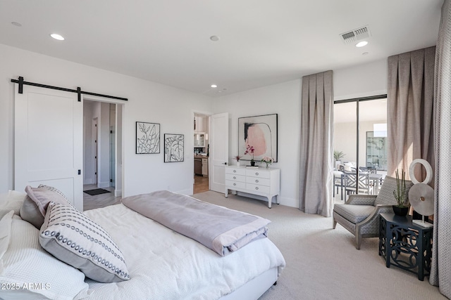 1920 E Creek Canyon Rd, Phoenix, AZ 85086 - bedroom with a barn door, light carpet, recessed lighting, and access to outside