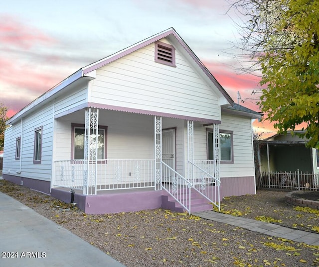 bungalow-style home with covered porch