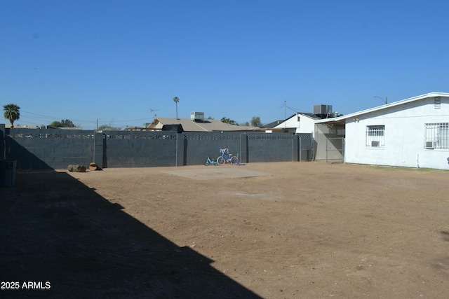 view of yard featuring central AC