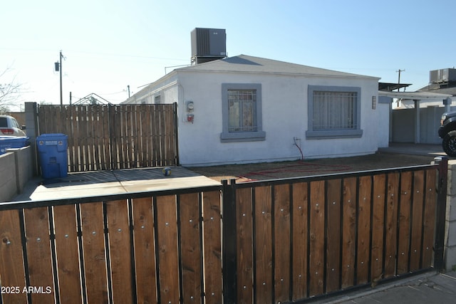 view of property exterior featuring central air condition unit