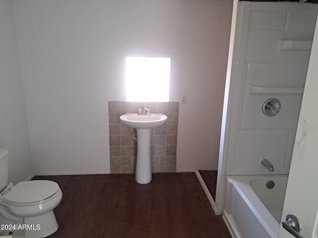 full bath with toilet and wood finished floors