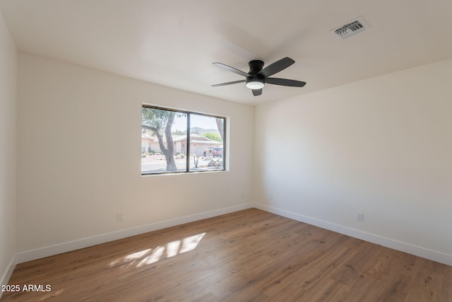 15038 E Greene Valley Dr, Fountain Hills, AZ 85268 - empty room with visible vents, ceiling fan, wood finished floors, and baseboards