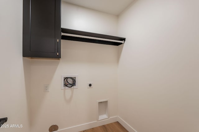 15038 E Greene Valley Dr, Fountain Hills, AZ 85268 - laundry room featuring hookup for an electric dryer, cabinet space, light wood-style flooring, and baseboards