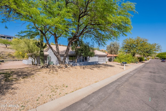15038 E Greene Valley Dr, Fountain Hills, AZ 85268 - view of property hidden behind natural elements with stucco siding