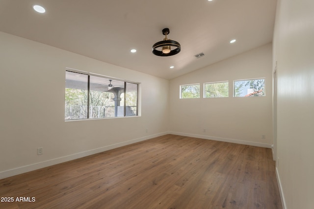 15038 E Greene Valley Dr, Fountain Hills, AZ 85268 - spare room with lofted ceiling, visible vents, baseboards, recessed lighting, and wood finished floors