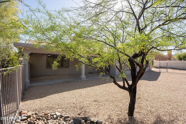 15038 E Greene Valley Dr, Fountain Hills, AZ 85268 - exterior space with fence, stucco siding, and a patio area